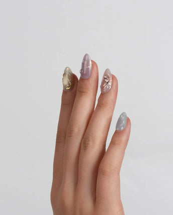 Koi Dream press-on nails in extra short almond shape — Shimmering Mermaid Pearl, Metallic Relief Goldfish & cat eye effict.