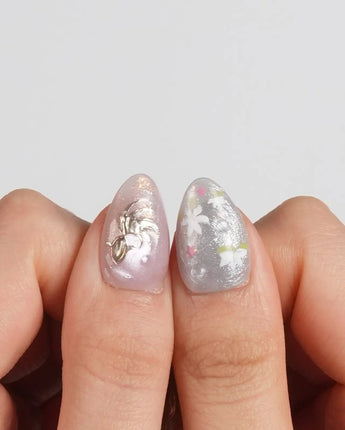 Koi Dream press-on nails in extra short almond shape — Shimmering Mermaid Pearl, Metallic Relief Goldfish & cat eye effict.