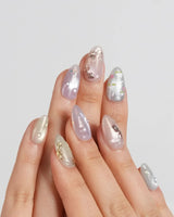 Koi Dream nail art close-up showing Shimmering Mermaid Pearl, Metallic Relief Goldfish & cat eye effict. details