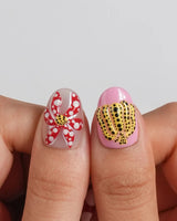 Kusama Dot short oval press-on nails with layered gel polka dot artwork