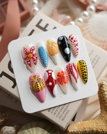 Kusama Dot medium stiletto press-on nails with bold multicolor dot design
