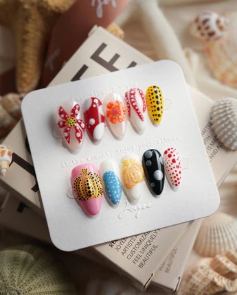 Kusama Dot short almond press-on nails with pop-art polka dots and glossy gel