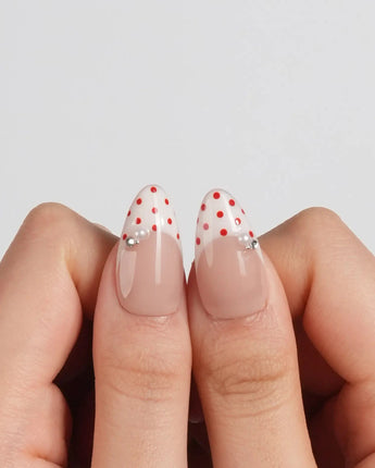 Ladybug Picnic press-on nails in short almond shape — Vintage Red Polka Dots, Hand-painted Ladybugs & French Pearl Accents.