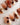 Handmade coffee bean nails with caramel swirl pattern
