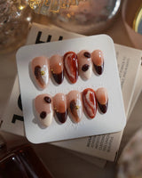 Latte Coffee medium almond press-on nails with coffee brown marble and 3D bean details