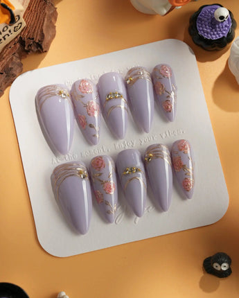Lavender Rose press-on nails in medium stiletto shape — Dreamy Light Purple, Hand-painted Roses & Metallic Outlines.