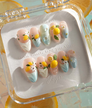 Lemon Shore handmade press-on nails featuring Nude & Aqua Blue, 3D Lemons & Florals.