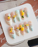Lemon Shore summer citrus nail set in nude, yellow and aqua blue tones