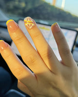 Lemon8❤️ nail art close-up showing lemon french tip 3D citrus nails details