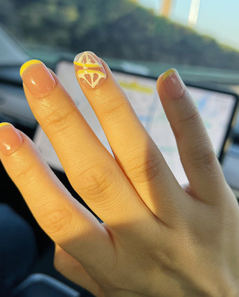 Lemon8❤️ nail art close-up showing lemon french tip 3D citrus nails details