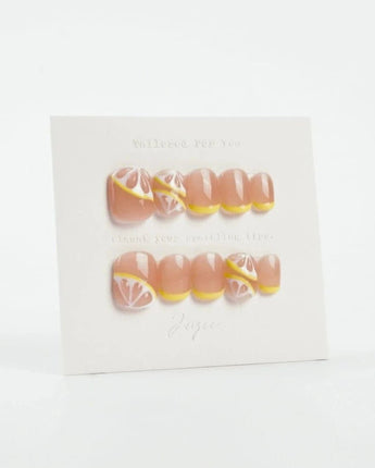 Lemon8❤️ press-on nails in short squoval shape — lemon french tip 3D citrus nails