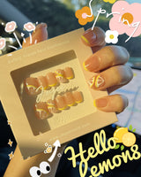 Lemon8❤️ press-on nails in short squoval shape — lemon french tip 3D citrus nails