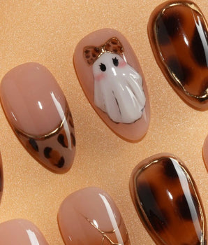 Leopard Boo press on nails with ghosts wearing leopard bows, amber tortoiseshell with gold chrome and leopard print French tips - image 3