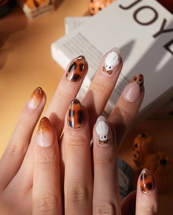 Leopard Boo press on nails with ghosts wearing leopard bows, amber tortoiseshell with gold chrome and leopard print French tips - image 2