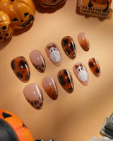 Leopard Boo press on nails with ghosts wearing leopard bows, amber tortoiseshell with gold chrome and leopard print French tips - image 1