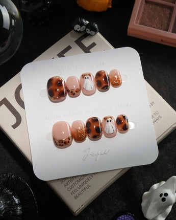 Leopard Boo handmade press-on nails in extra short squoval shape by Joyee Nails
