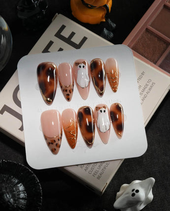 Leopard Boo handmade press-on nails in medium stiletto shape by Joyee Nails