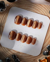 Light Brown Color Cat-eye Nails press-on nails in extra short squoval shape — light brown cat eye