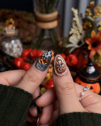 Lights Out press-on nails in short almond shape — Glitter Halloween, 3D Pumpkin & Cross.