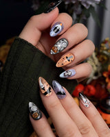 Lights Out press-on nails in short almond shape — Glitter Halloween, 3D Pumpkin & Cross.