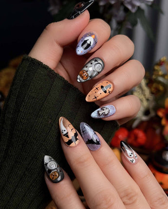 Lights Out press-on nails in short almond shape — Glitter Halloween, 3D Pumpkin & Cross.