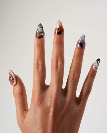 Lights Out press-on nails in short almond shape — Glitter Halloween, 3D Pumpkin & Cross.