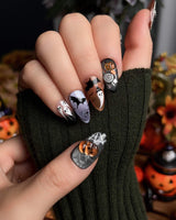 Lights Out press-on nails in short almond shape — Glitter Halloween, 3D Pumpkin & Cross.