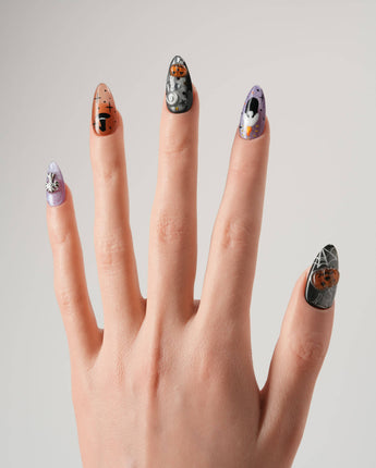 Lights Out nail art close-up showing Glitter Halloween, 3D Pumpkin & Cross. details