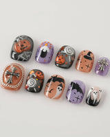 Lights Out press-on nails in extra short squoval shape — Glitter Halloween, 3D Pumpkin & Cross.