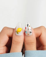Limoncello handmade citrus nails with colorful gemstones and delicate silver accents