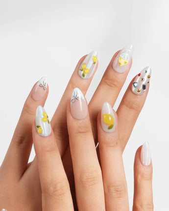 Limoncello glossy lemon nail art with candy-like yellow fruit details