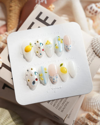 Limoncello Italian lemon press-on nails in extra short almond shape