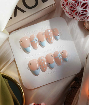 Love Gift - Blue handmade press-on nails featuring Fresh Sky Blue, Bows & Polka Dots.
