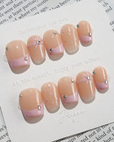 Love Gift press-on nails in extra short coffin shape — Soft Pink French, Bows & Polka Dots.