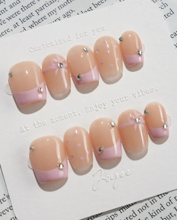 Love Gift press-on nails in extra short coffin shape — Soft Pink French, Bows & Polka Dots.