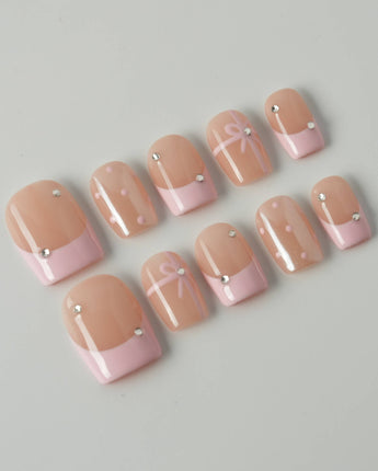 Love Gift press-on nails in extra short square shape — Soft Pink French, Bows & Polka Dots.