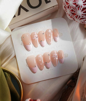 Love Gift handmade press-on nails featuring Soft Pink French, Bows & Polka Dots.