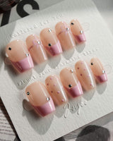 Love Gift press-on nails in short coffin shape — Soft Pink French, Bows & Polka Dots.