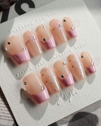 Love Gift press-on nails in short coffin shape — Soft Pink French, Bows & Polka Dots.