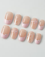 Love Gift press-on nails in short oval shape — Soft Pink French, Bows & Polka Dots.