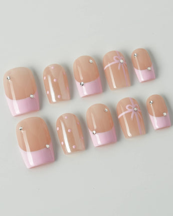 Love Gift press-on nails in short square shape — Soft Pink French, Bows & Polka Dots.