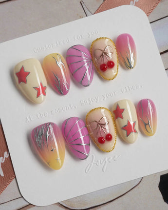 Love Is Not Over extra short almond press-ons with playful cherry and flame nail art