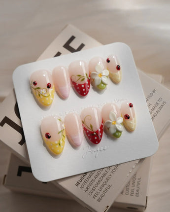 Lucky Dot press-on nails in short almond shape — Cute Pastoral, Hand-painted Ladybugs & Red Polka Dot French Tips.