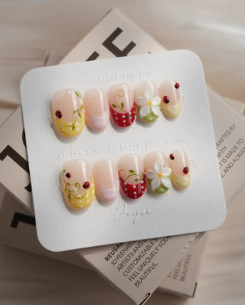 Lucky Dot press-on nails in short oval shape — Cute Pastoral, Hand-painted Ladybugs & Red Polka Dot French Tips.