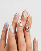 Lulu's Cone pastel animal ice cream nail art with drip and chocolate swirl details