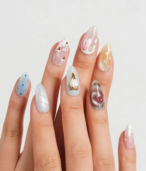 Lulu's Cone pastel animal ice cream nail art with drip and chocolate swirl details