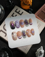 Luminous Spider handmade press-on nails in short oval shape by Joyee Nails