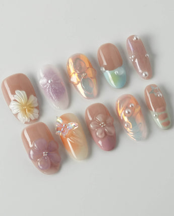 Wonderland Whims luxury floral press-on nails with sculpted blossoms and delicate pearls