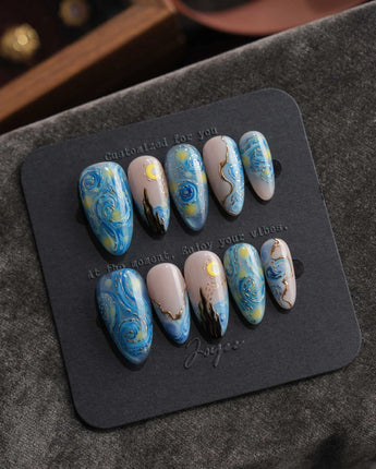 Starry Night press on nails hand-painted in blue and gold, inspired by Van Gogh