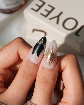 Egyptian Gold press on nails with 3D gold sun, scarab and ankh on nude base